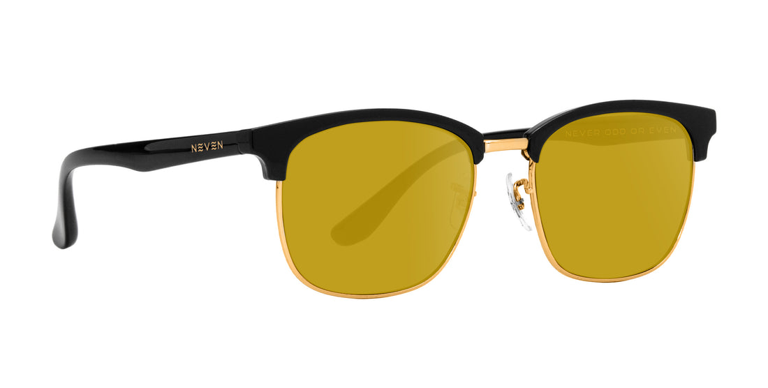 Front-left of Gold Rush prescription sunglasses showing black browline frame, gold rims and yellow lenses on white