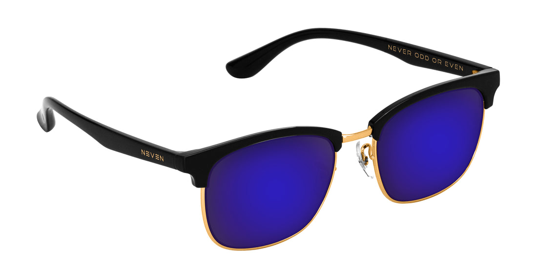 Close-up of Gold Rush sunglasses showcasing black TR90 frame, gold rims and purple mirrored lenses on white background