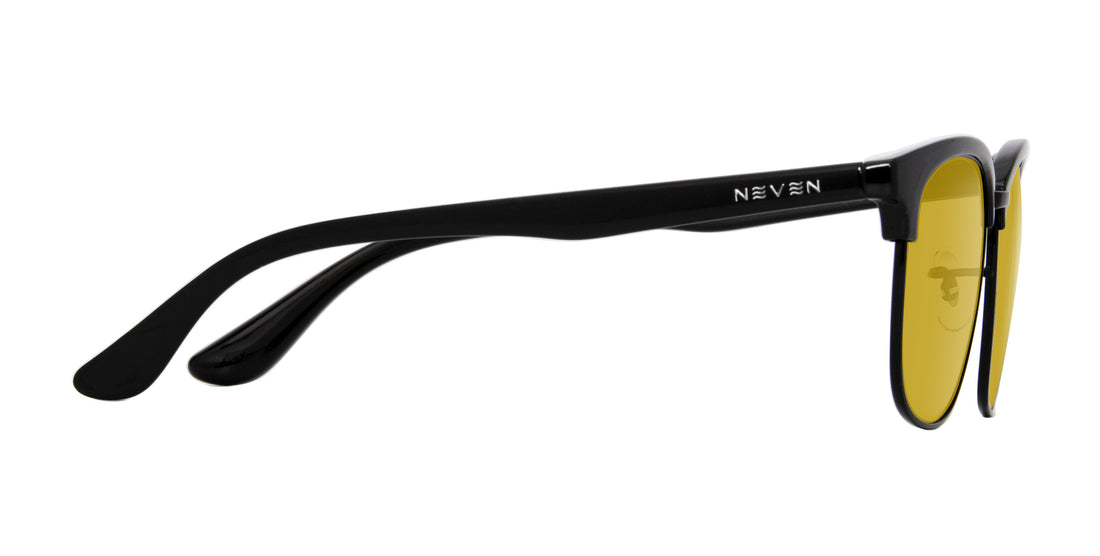 Side view of Stealth prescription sunglasses showcasing black TR90 temple with Neven logo and yellow lenses on white background