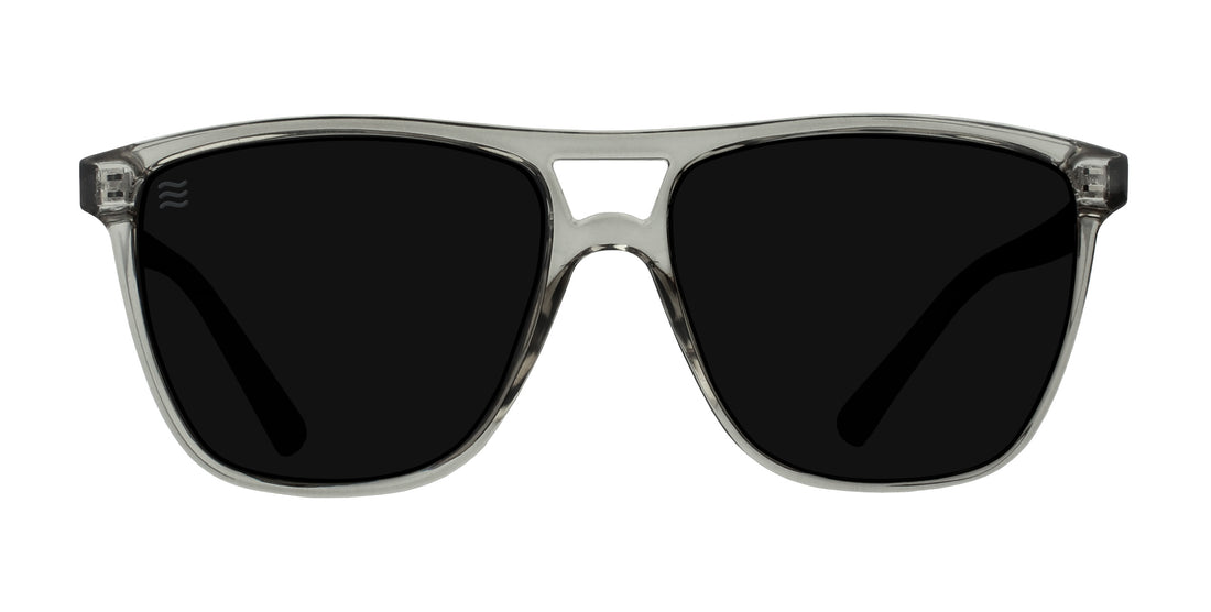 Rip Tide clear frames polarized sunglasses with black lenses.