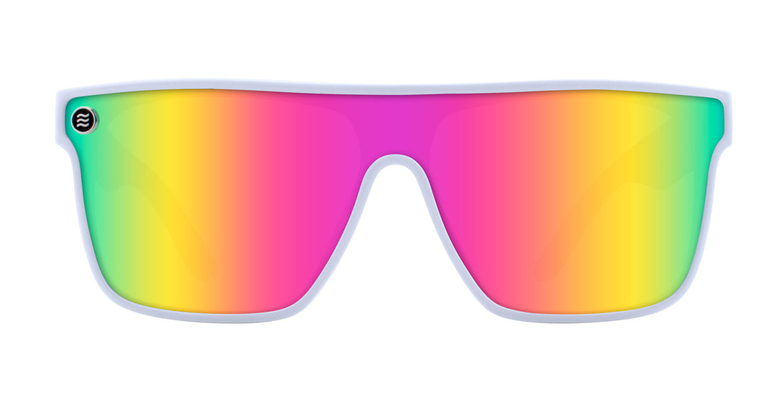Front close-up of Muse sunglasses showing white gloss frame and large pink-yellow mirrored lenses with metal logo on white
