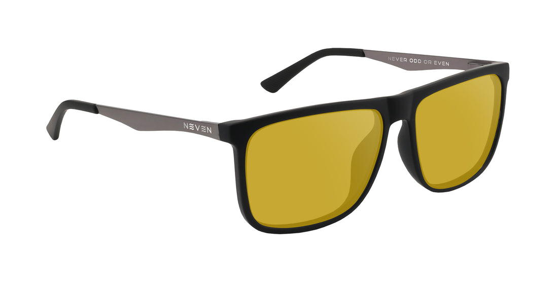 Angled close-up of Blueprint prescription sunglasses with yellow lenses, black rectangular frame and metal temples on white