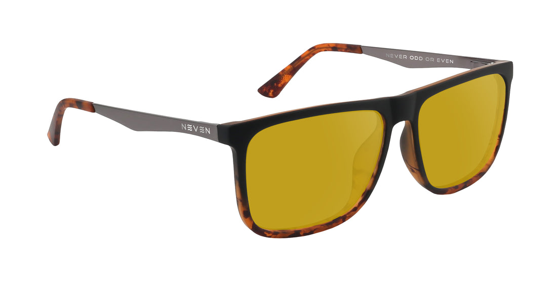 Angled close-up of Repeater Rx sunglasses showing black frame with tortoiseshell splatter and yellow lenses on white background