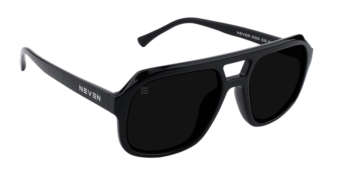 Three quarter view of Cosmo aviator sunglasses showcasing blacked out lenses and glossy black frame on white background