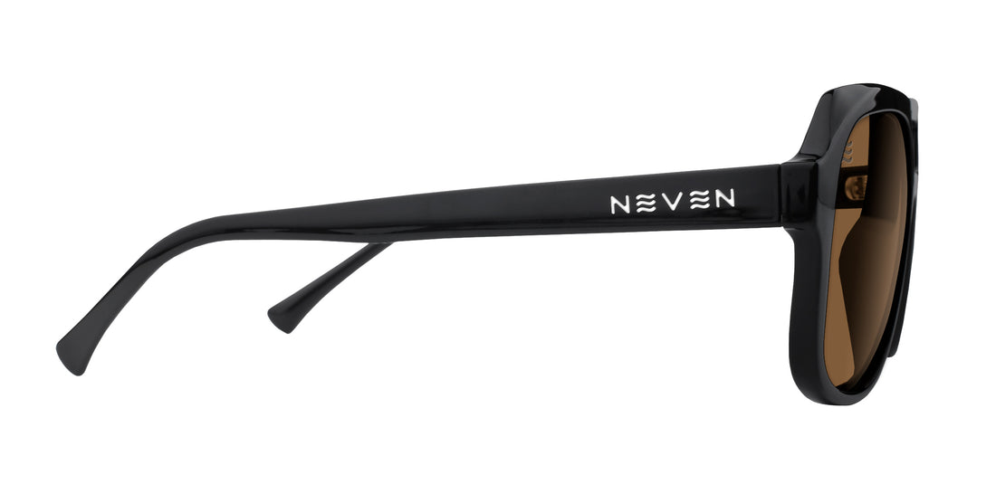 Side view of Gaia sunglasses showing black glossy frame, brown polarized lenses and NEVEN logo on the temple on a white background