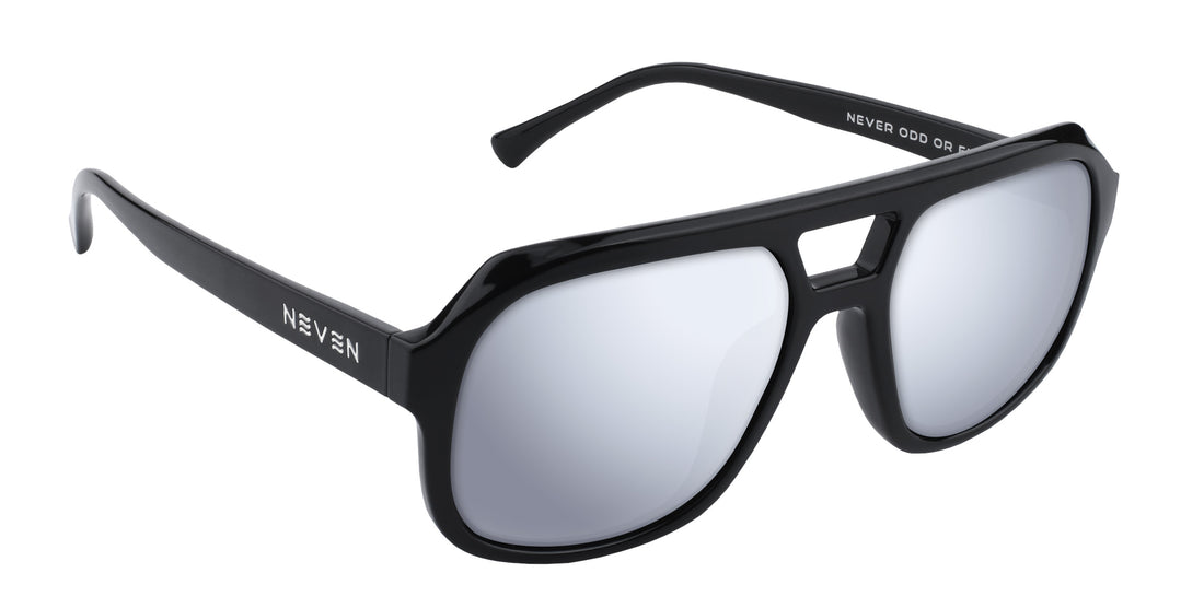 Angled close-up of Gaia sunglasses showing black glossy frame, mirrored Rx lenses and temple logo on white background