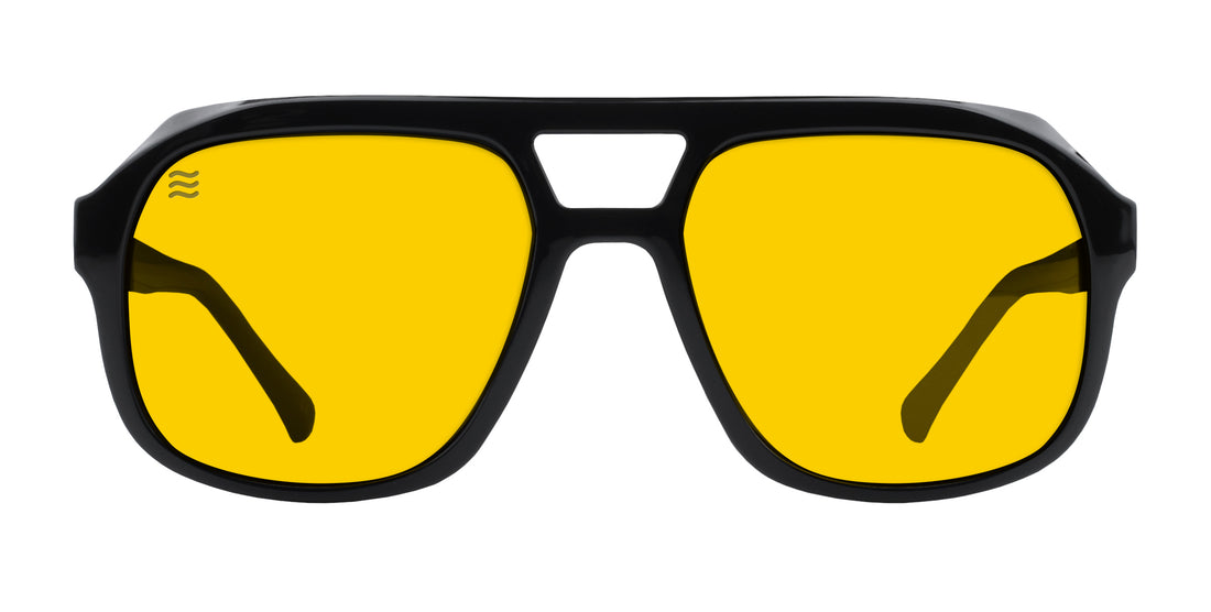 Front view of Helios sunglasses showcasing a black rectangular frame and yellow polarized lenses on a white background