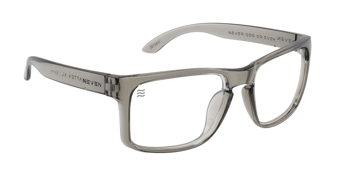 Three-quarter view of Stormy XL Z87+ safety eyewear showcasing clear lenses and a translucent gray frame on white