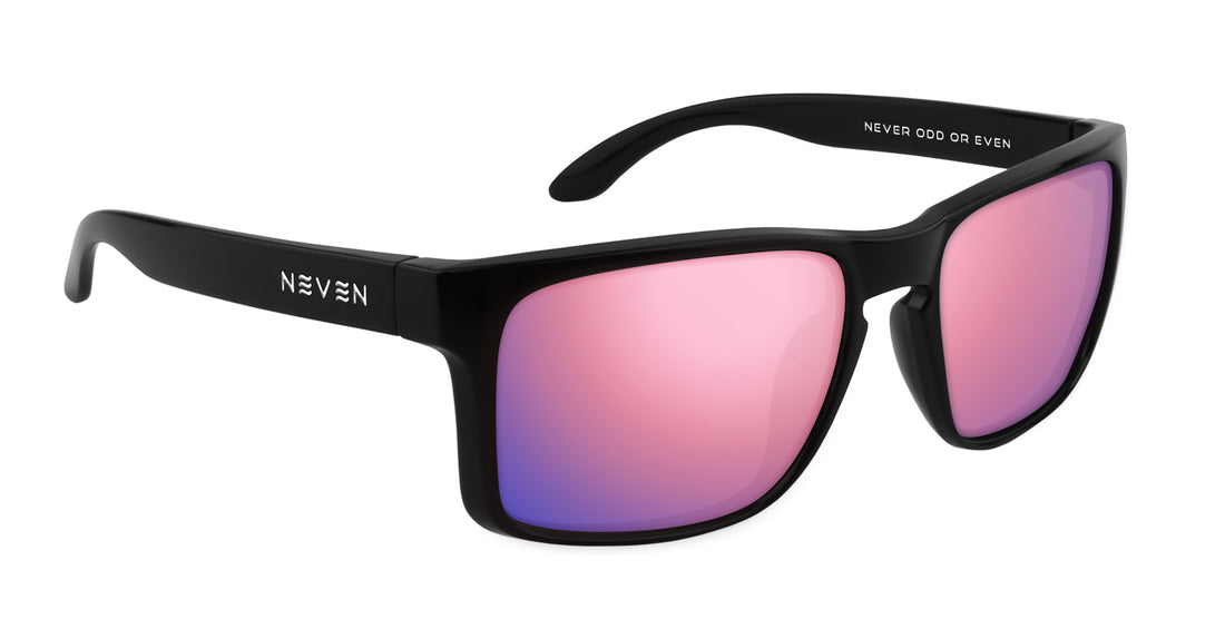 Three-quarter view of Doom XL oversized black rectangular prescription sunglasses with rose-pink lenses on white background