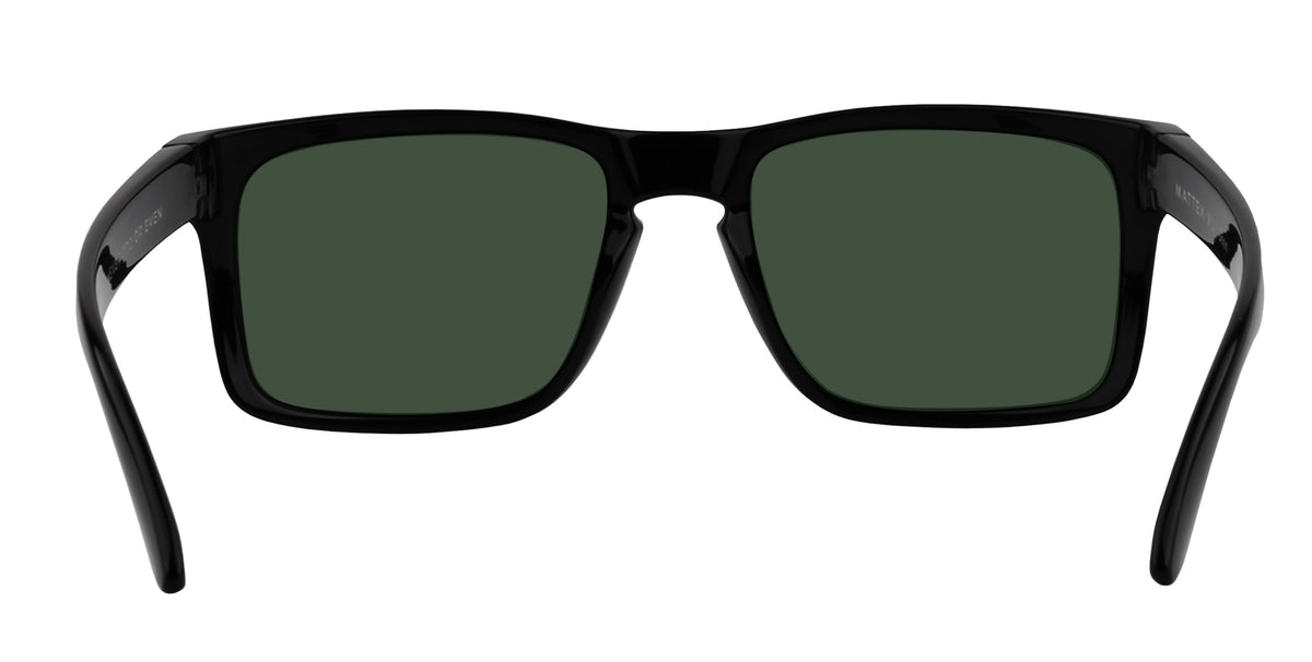 Front view of John Wayne XL sunglasses showcasing oversized glossy black rectangular frame with red mirrored polarized lenses on white background