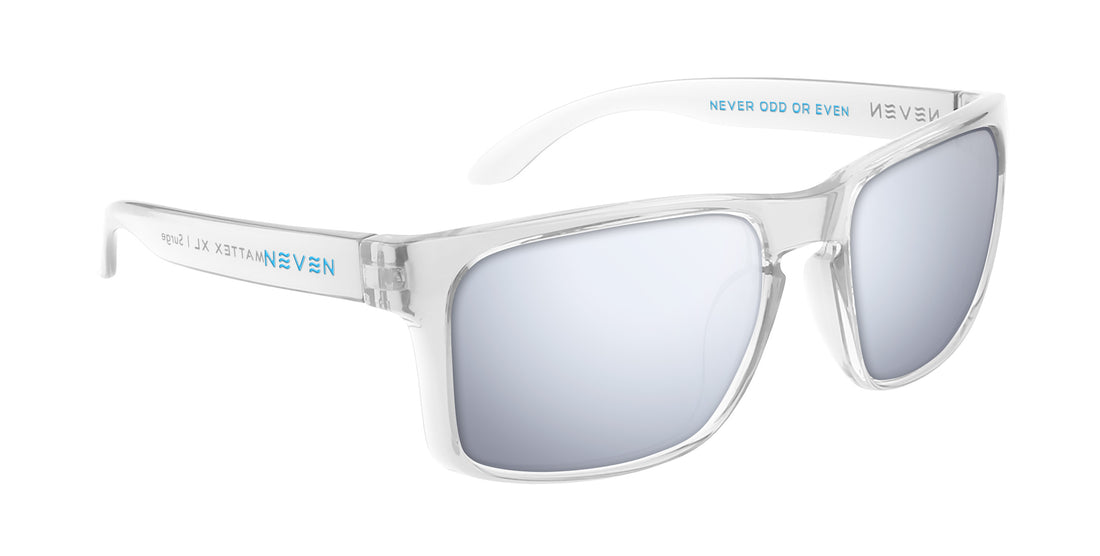 Three-quarter close-up of Surge XL prescription sunglasses with clear frame, silver mirrored lenses, and blue “NEVEN” logo on the temple