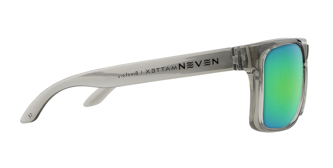 Side close-up of Breakers Rx sunglasses showing transparent gray glossy frame, quick-close hinge, and green mirrored lens
