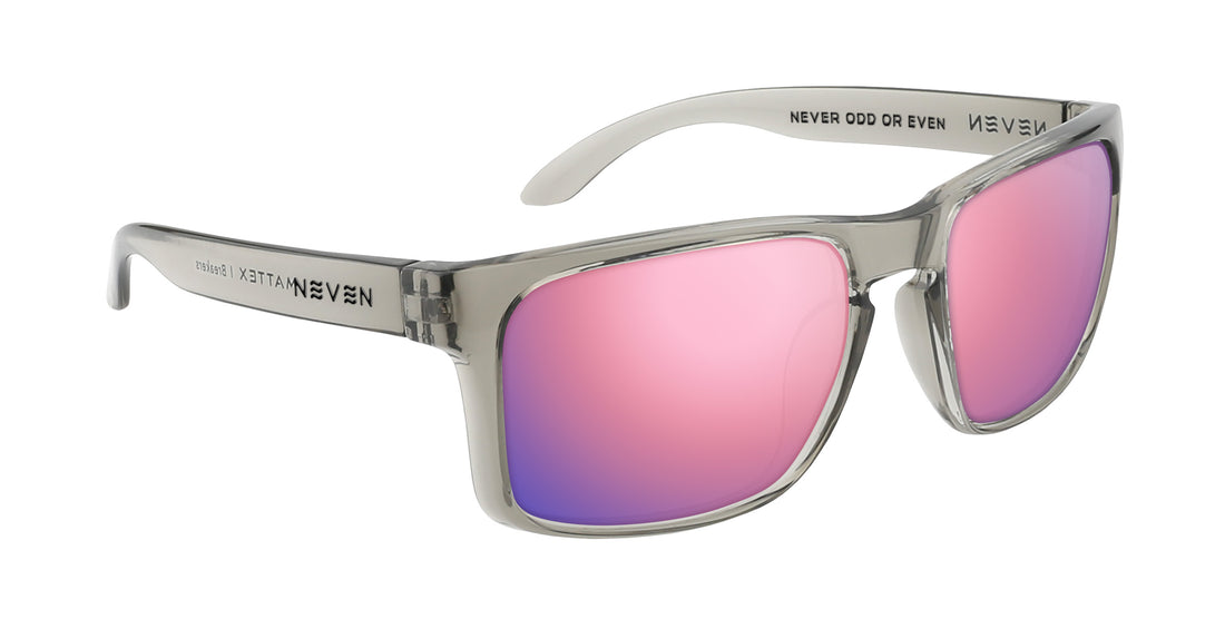 Three-quarter view of Breakers sunglasses with transparent gray glossy rectangular frame and rose-pink mirrored lenses