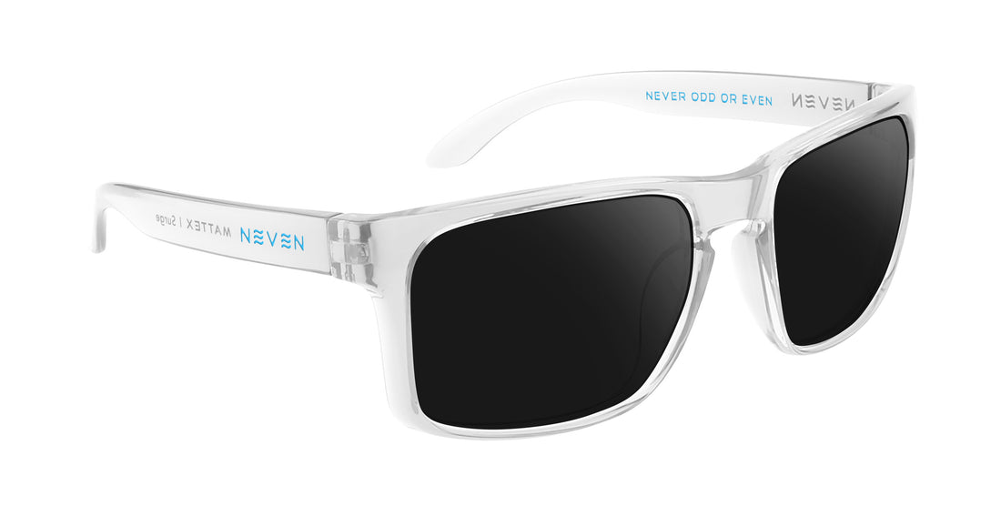Angled view of Surge Rx sunglasses with clear rectangular gloss TR90 frame, black lenses and quick-close hinges on white