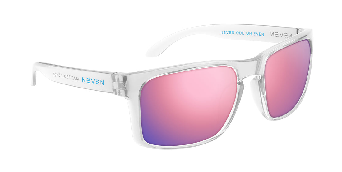 Angled close-up of Surge prescription sunglasses showing clear rectangular frame, quick-close hinges and pink mirrored lenses