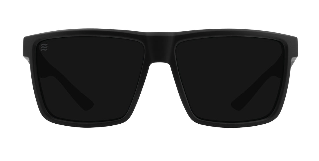 Front view of Honey Hole sunglasses showcasing matte black rectangular frame and polarized black lenses on white background