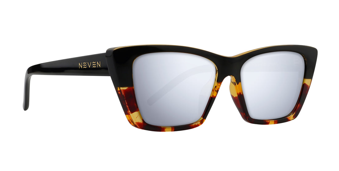 Right-front view of Dusk prescription sunglasses showing glossy black-to-tortoise cat-eye frame with gold Neven logo and silver mirrored lenses on white background