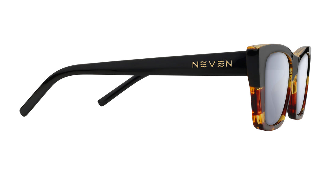 Side view of Dusk prescription sunglasses with glossy black temple, gold Neven logo, and tortoise-shell cat-eye front on white