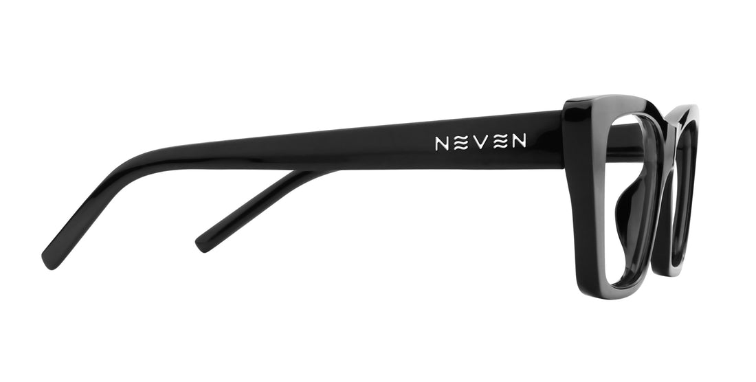 Side view of Noir cat eye prescription glasses showing glossy black TR90 temple with silver NEVEN logo on white background