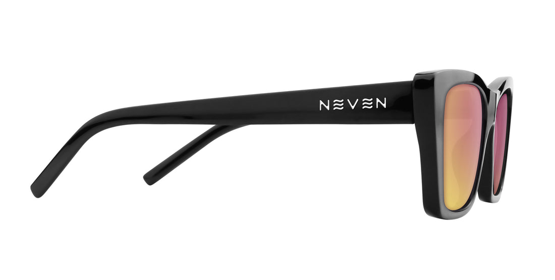 Side view of Noir cat eye sunglasses showing glossy black temple with Neven logo and rose pink mirrored lenses on white