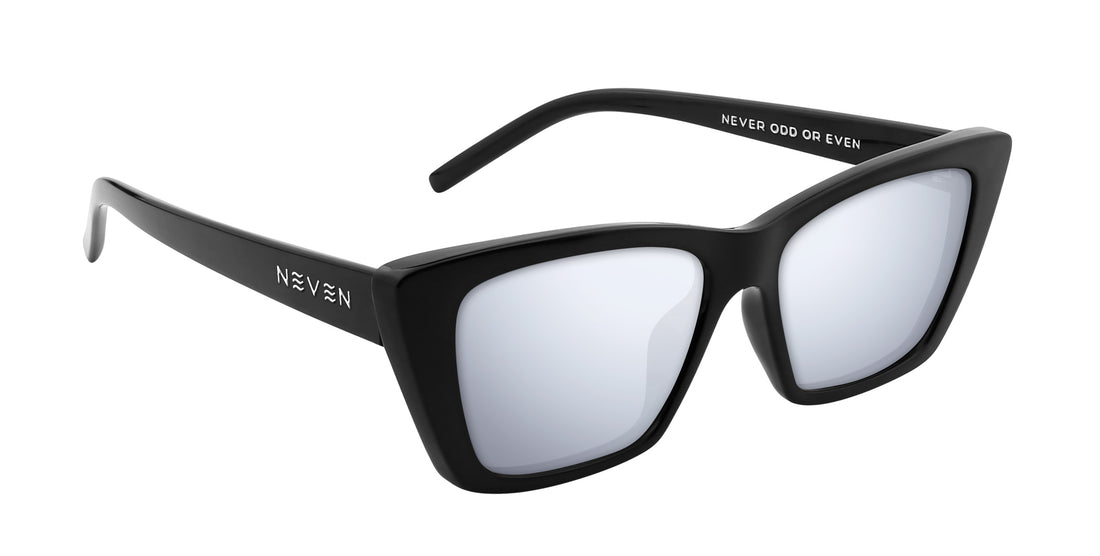 Three-quarter view of Noir cat-eye prescription sunglasses, black acetate frame with silver mirrored lenses and Neven logo on the temple