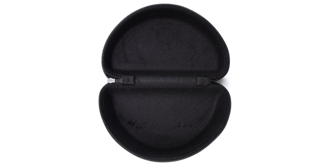 Top-down view of Signature Hard Case open showing black plush-lined interior, zipper pull and elastic strap on white background