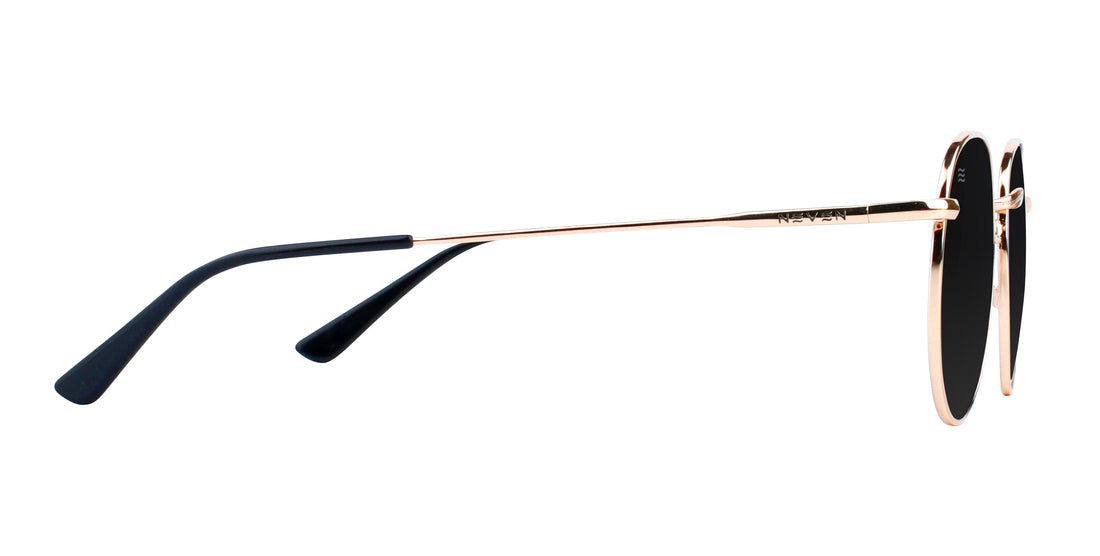 Side view of Rae round gold sunglasses showcasing black polarized lenses and slim metal frames on a white background