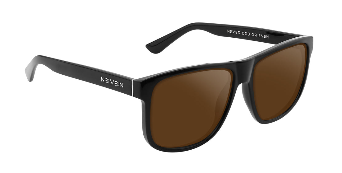 Angled close-up of Cinder sunglasses showcasing glossy black frame, maroon mirrored lenses, and silver temple logo on white background