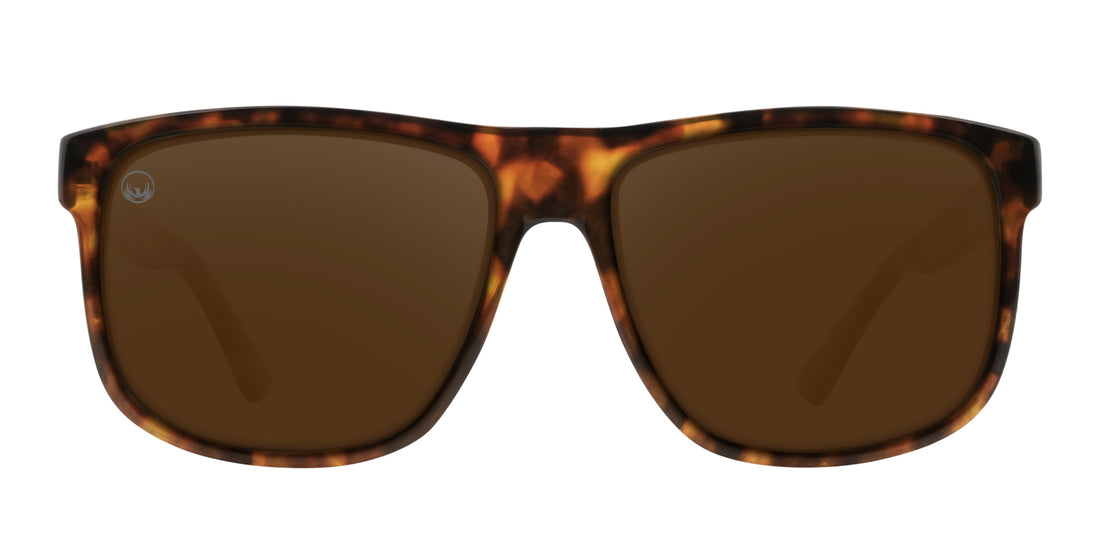 Front view of Ember sunglasses showcasing tortoise shell rectangular frame and brown polarized lenses with etched Phoenix logo on white background