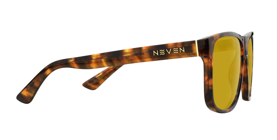 Close side view of Ember Rx prescription sunglasses showcasing tortoise shell temple with gold NEVEN logo and yellow lenses on white background