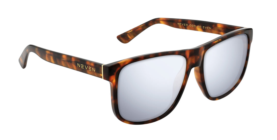 Angled close-up of Ember Rx sunglasses with tortoise shell frame, gold Neven temple logo and silver mirrored lenses on white