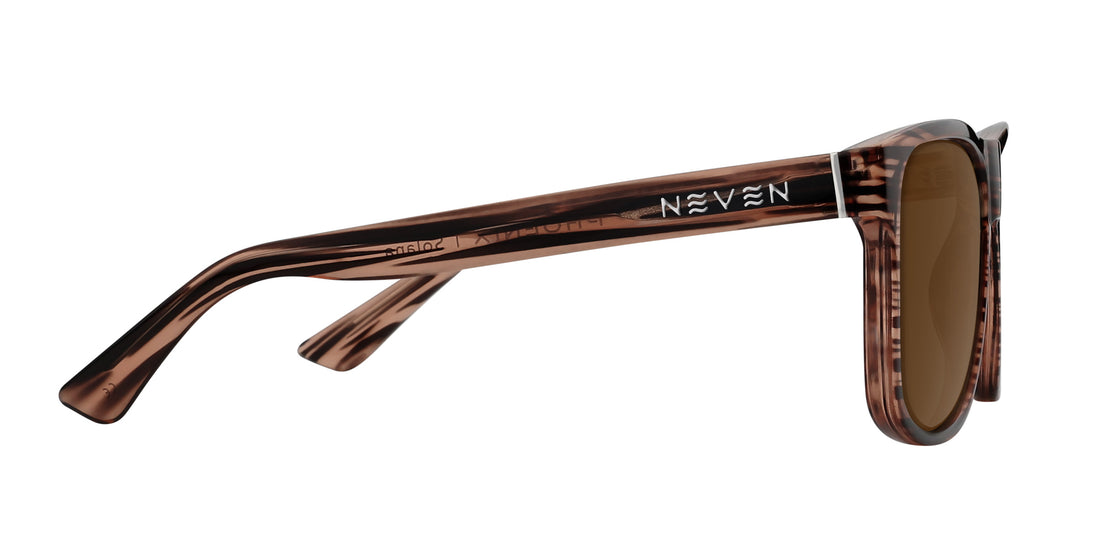 Side view of Solana prescription sunglasses showcasing transparent wood-grain brown frame and Neven logo on the temple