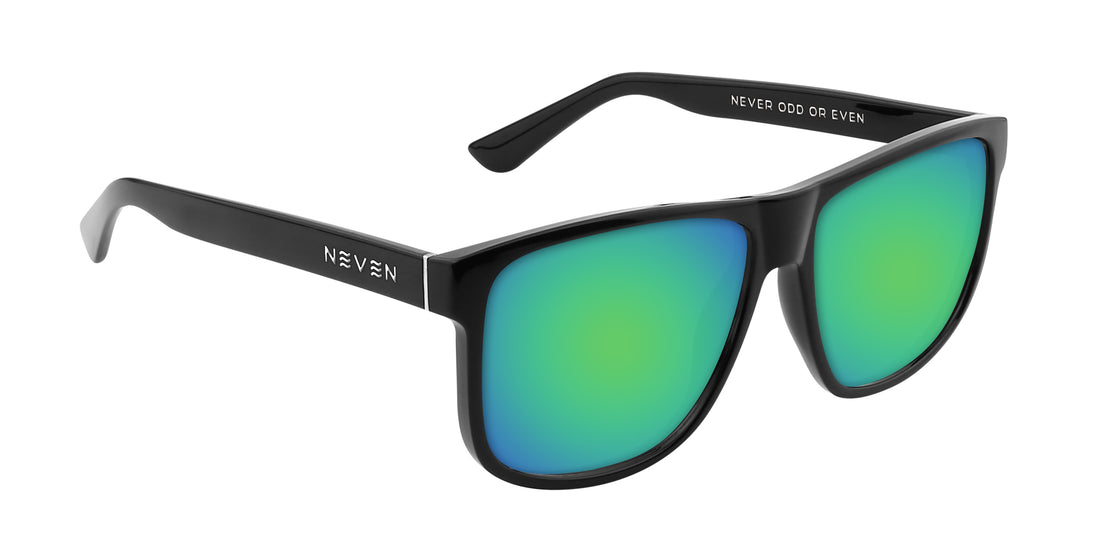 Angled close-up of Triumph Rx sunglasses showcasing glossy black large frame and green mirrored lenses on white background