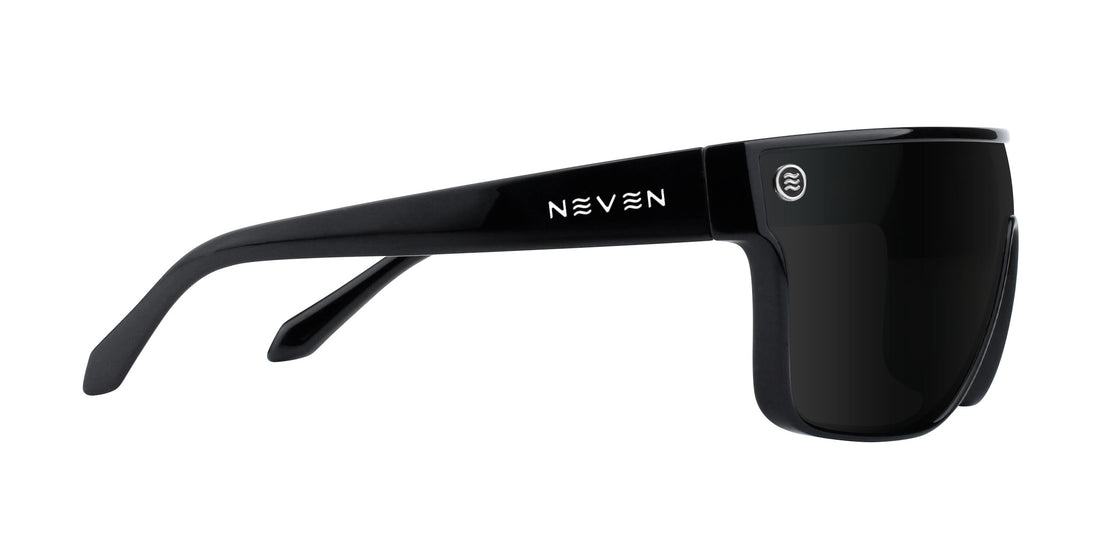 Side view of Wire sunglasses showing gloss black frame, black polarized shield lens and steel logo on white background
