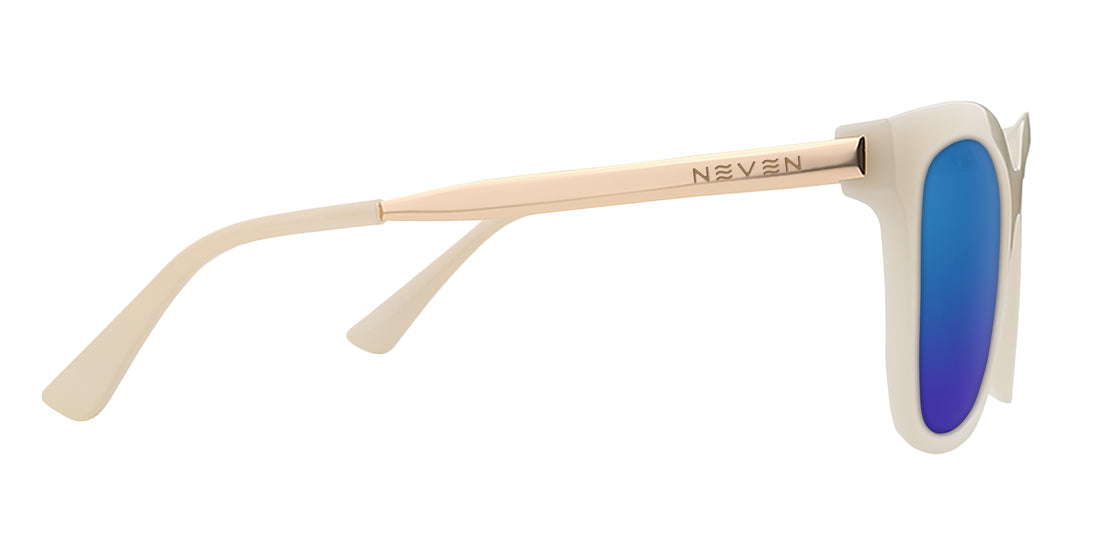Side close-up of Sand Dollar sunglasses with cream greige frame, engraved gold NEVEN arm and blue mirrored lens