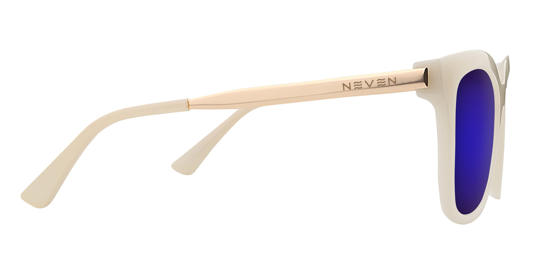Side view of Sand Dollar sunglasses showing greige frame, engraved gold arm with NEVEN logo and purple mirrored lens on white