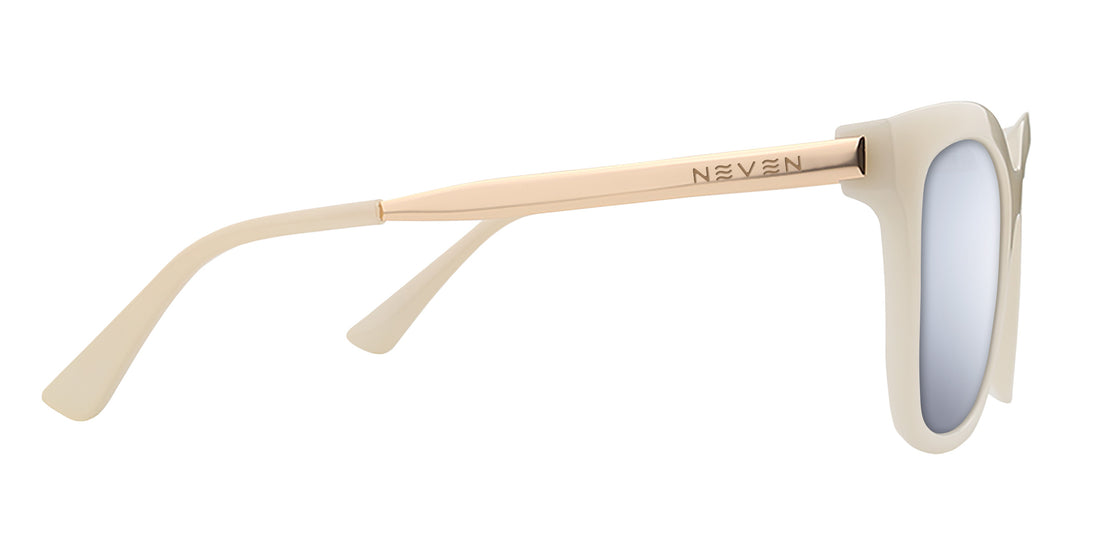 Close up side view of Sand Dollar sunglasses showing milky white greige frame and gold engraved metal arm on white background