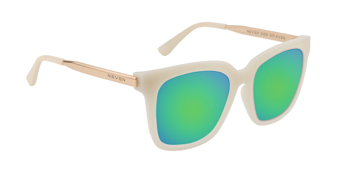 Three quarter view of Sand Dollar prescription sunglasses with greige frames, gold metal arms, and green mirrored lenses