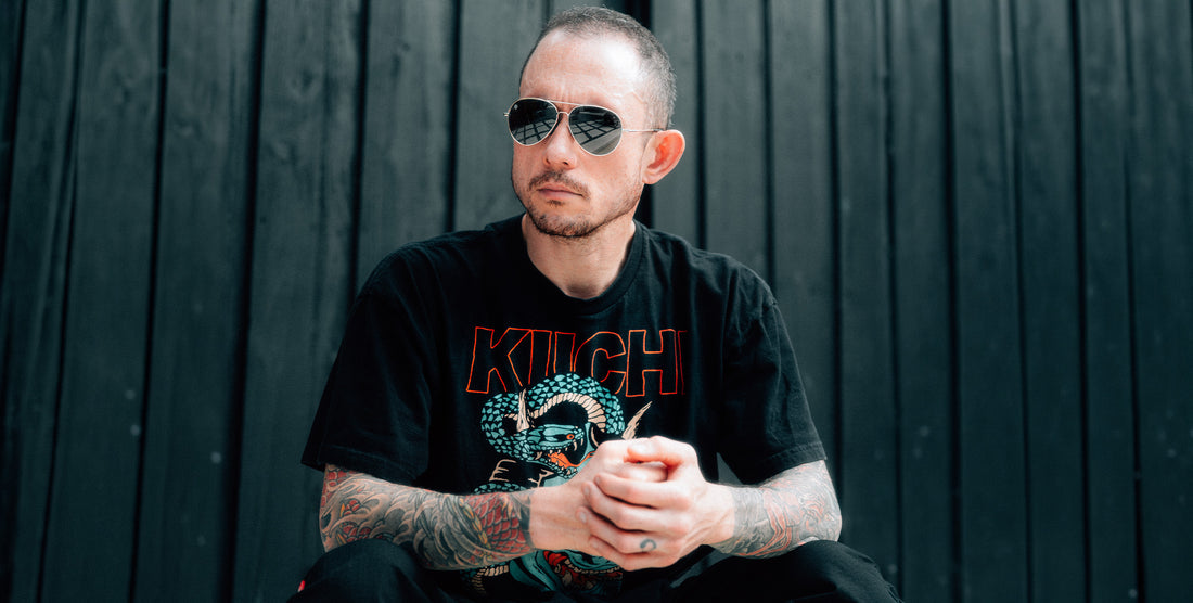 Kintsugi gold aviator polarized sunglasses by Neven Eyewear worn by Matthew Heafy with metal frame and black lenses.