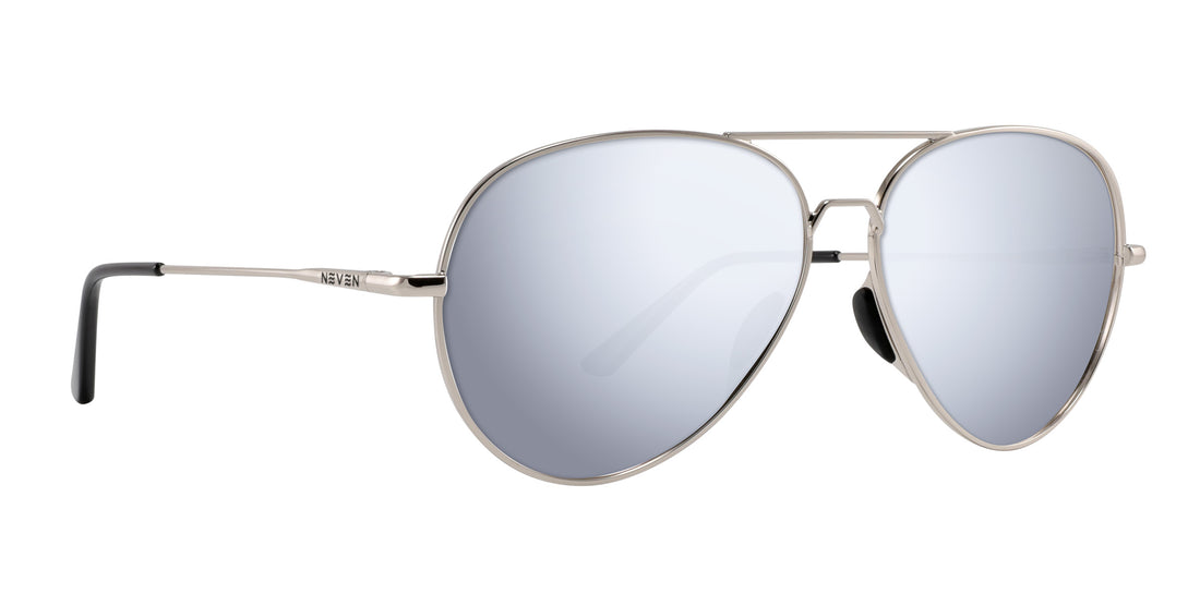 Three-quarter view of Shirogane aviator sunglasses showcasing polished silver metal frame and mirrored lenses on white