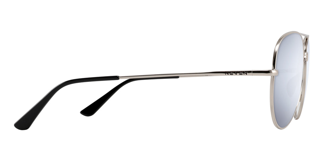 Side view of Shirogane sunglasses showcasing polished silver metal aviator frame and black temple tips on white background