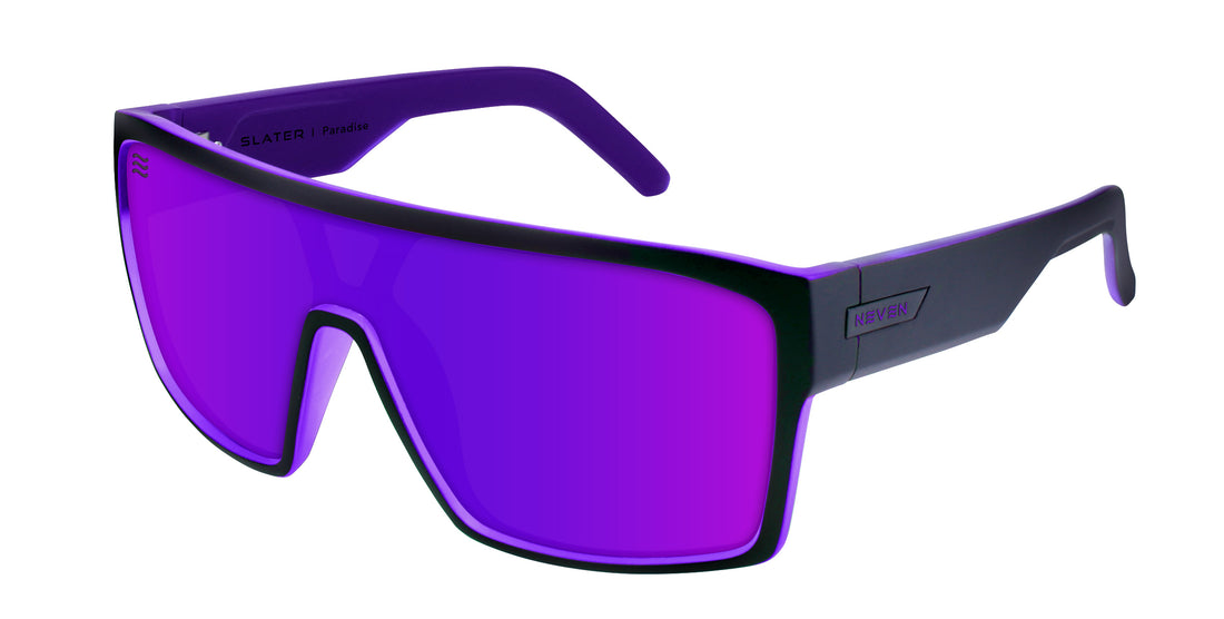 Three-quarter view of Paradise X-Large sunglasses, matte black/purple frame with purple polarized lens on white background
