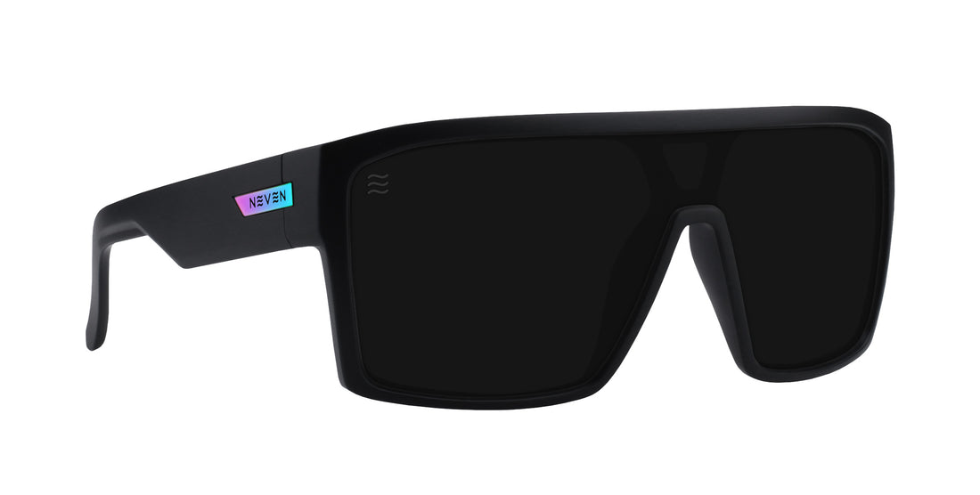 Front three-quarter view of RC’s Slater sunglasses showcasing a black frame and dark lenses on a white background