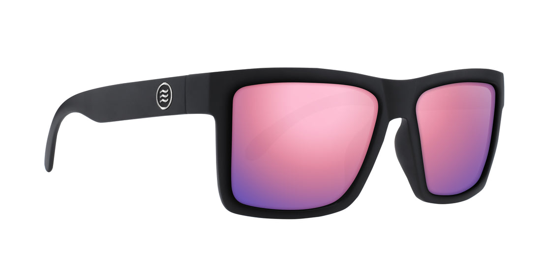 Front view of Lowrider XXL prescription sunglasses showcasing black frames and rose-pink gradient lenses on a white background