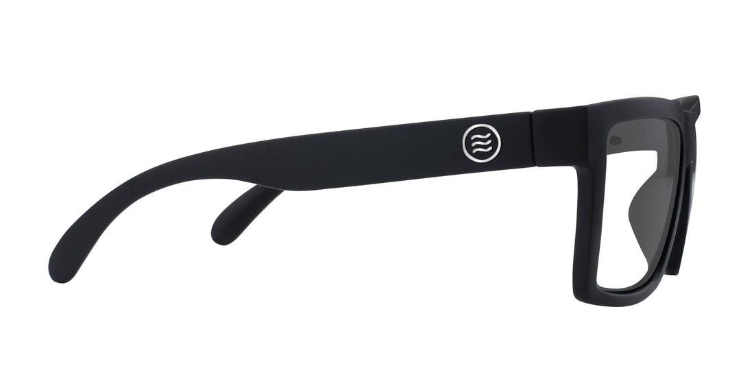 Side view of Malibu XL sunglasses showcasing matte black rectangular frame and Tombstone logo on temple with white background