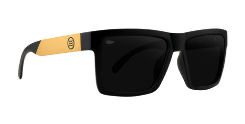 Right three-quarter view of Prospector XL sunglasses with black polarized lenses, gold temples, and coffin lens stamp on white