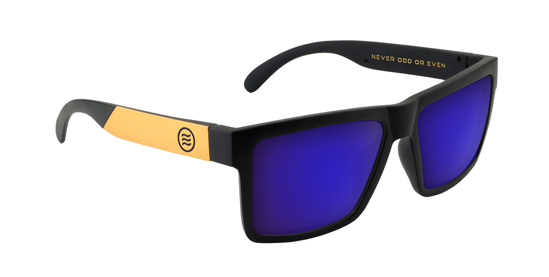 Right three-quarter view of Prospector XL Rx sunglasses with matte black frame, gold temples and blue mirrored lenses