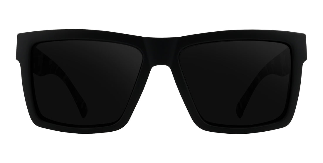 Front close-up of Bad Company sunglasses showcasing large matte black/camo rectangular frame with dark prescription lenses on white background