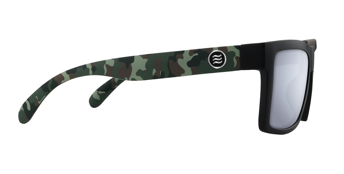 Side view of Bad Company sunglasses showing camo-pattern temples, black square frame, and mirrored silver lenses on white background