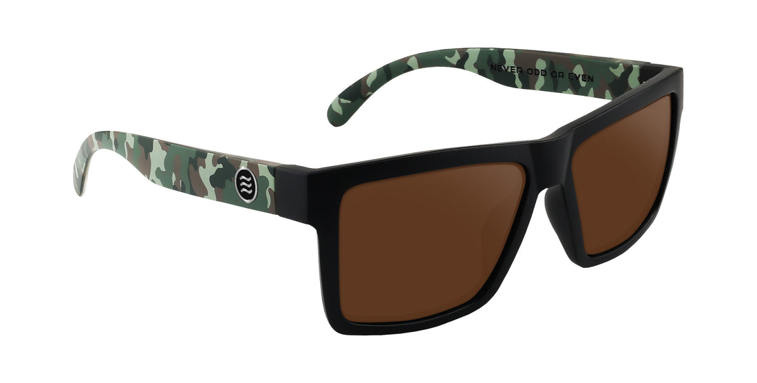 Three-quarter view of Bad Company prescription sunglasses showcasing a matte black front, camo temples, and brown lenses on a white background